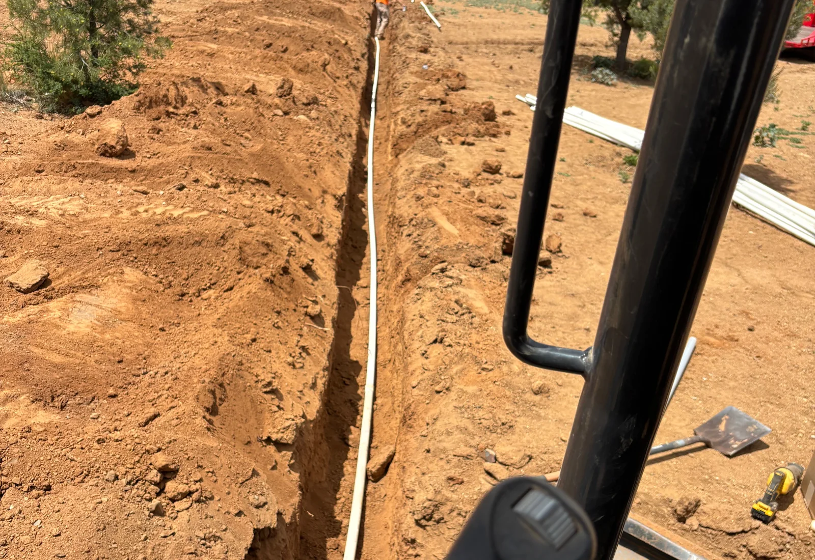 New plumbing utility run installed across an active work site