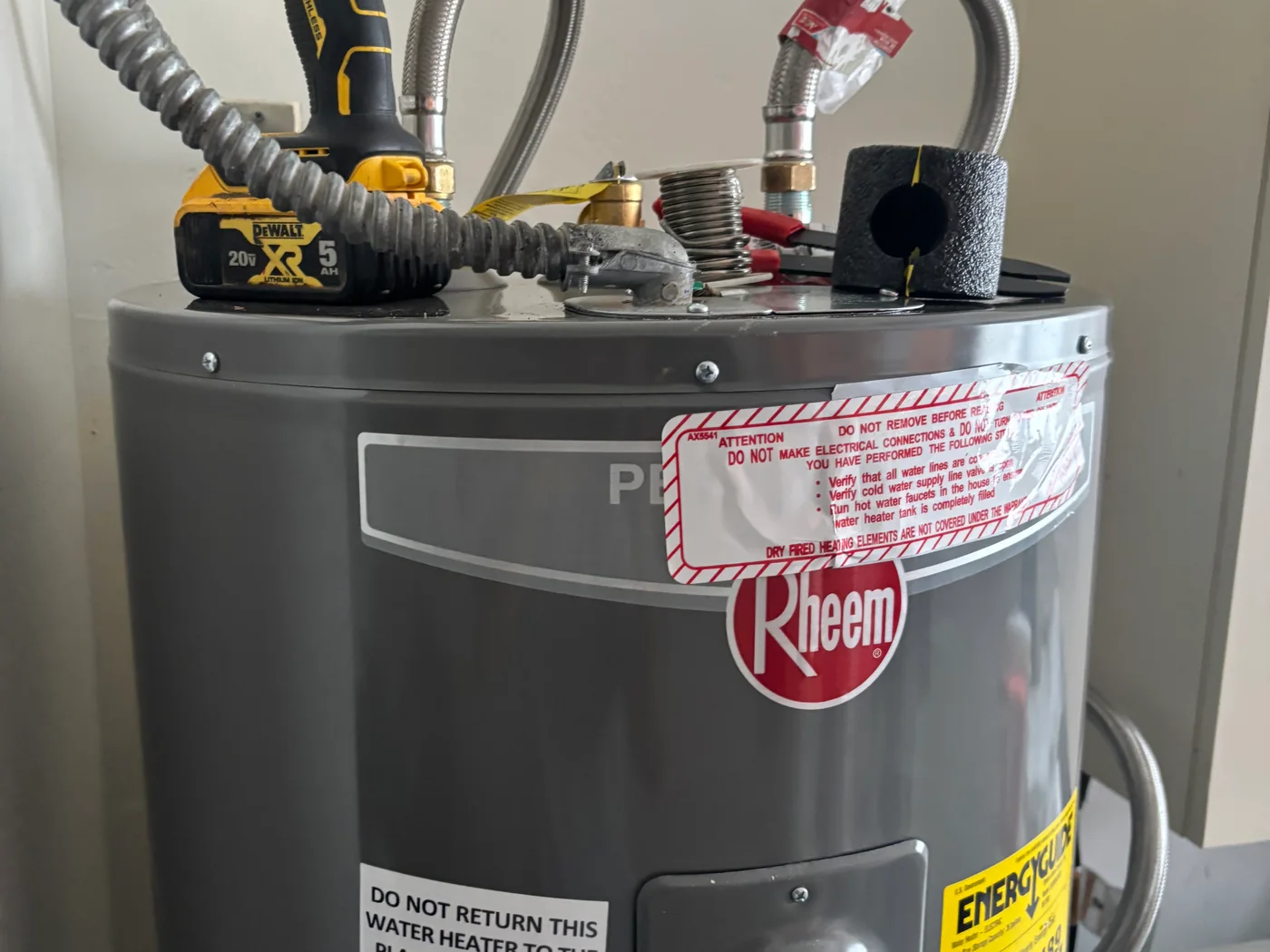 Tank water heater during plumbing installation